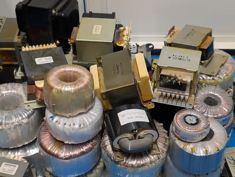 a collection of copper transformers